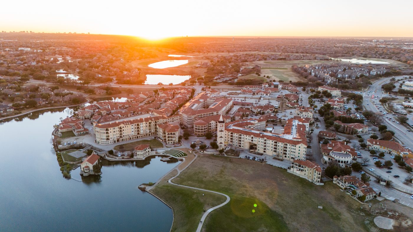 An aerial view of Adriatica Village in McKinney at sunset.